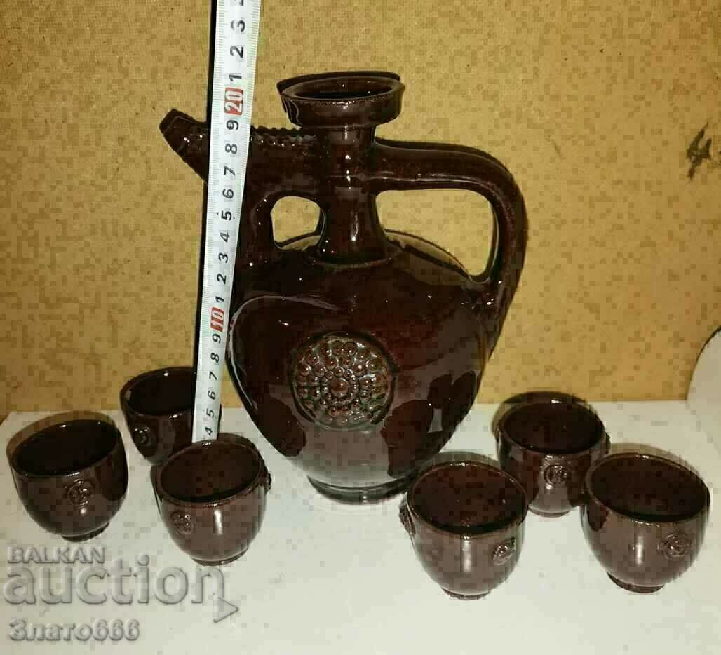 Ceramic pitcher with cups