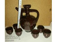 Ceramic pitcher with cups