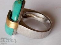 Silver, gold, turquoise. A ring.