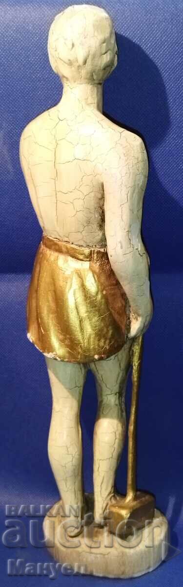 Auction Sculpture of a slave with a hammer. Auction Sculpture of a slave with a hammer.