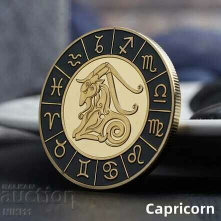 Capricorn zodiac coin in a protective capsule, zodiac signs, zodiac