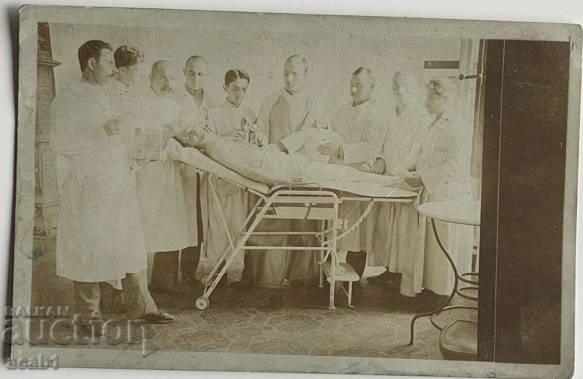 Doctors around patient