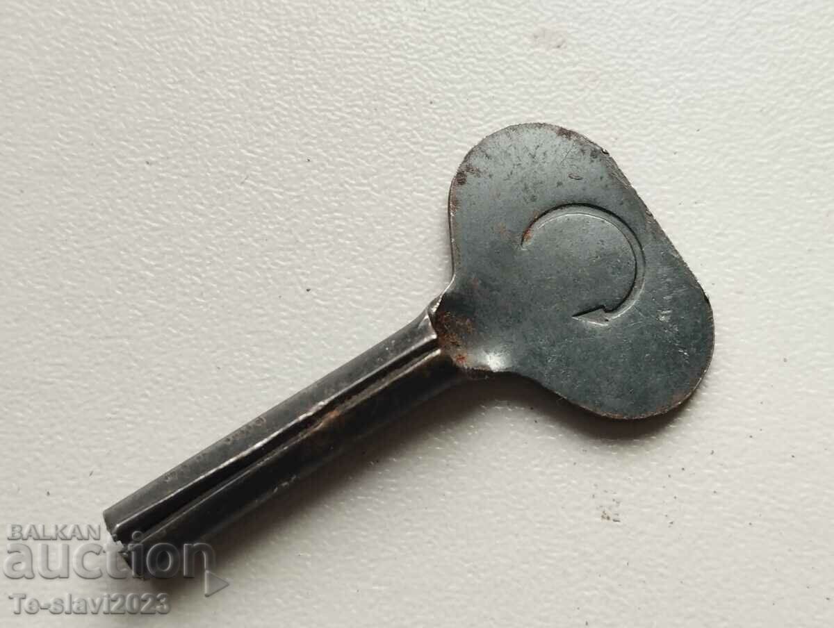 Old mechanical toy key -