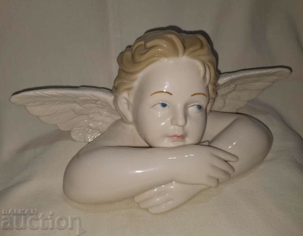 Auction Vintage porcelain angel cherub figure Auction Vintage porcelain angel cherub figure