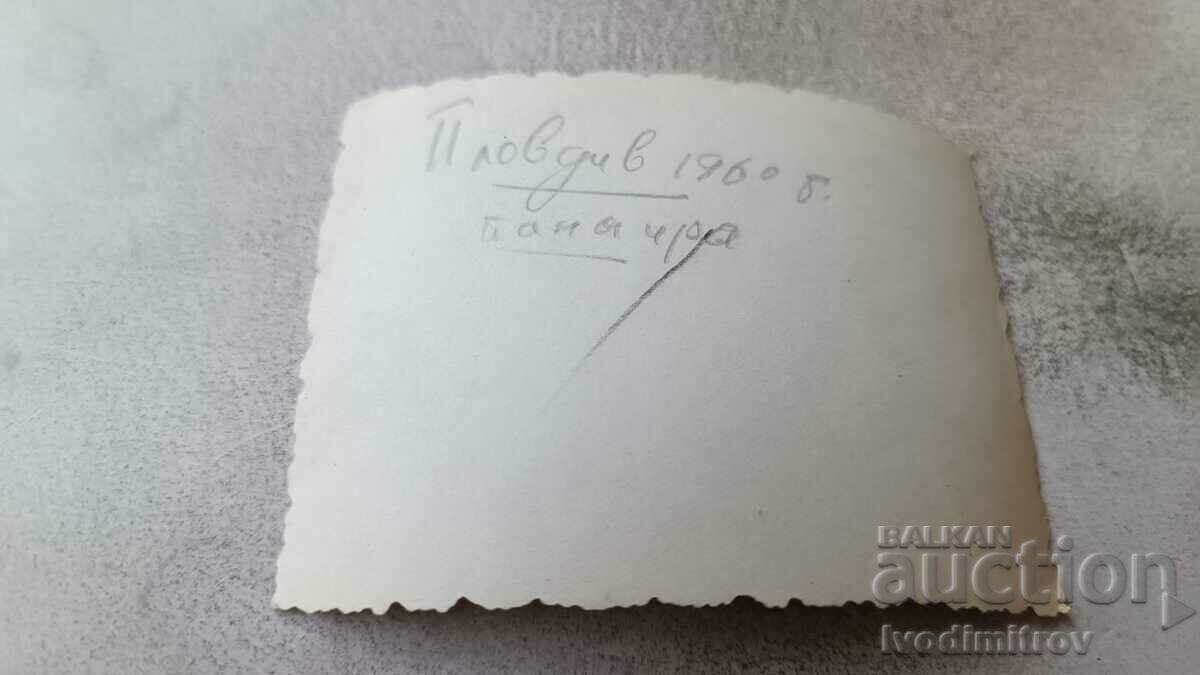 Photo Plovdiv Men, woman and boy next to a black bear 1960 with price 1.65 BGN | € 0.84 Photo Plovdiv Men, woman and boy next to a black bear 1960 with price 1.65 BGN | € 0.84