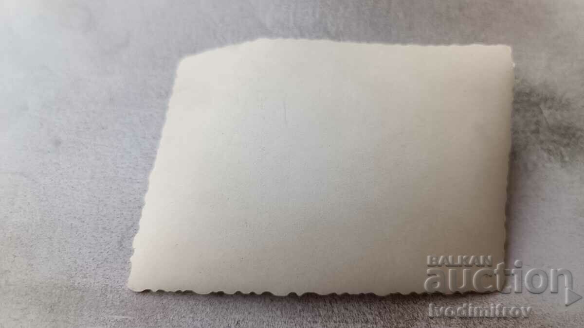 Photo Two young men and two girls on the beach with price 1.65 BGN | € 0.84 Photo Two young men and two girls on the beach with price 1.65 BGN | € 0.84