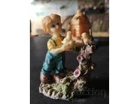 Retro vintage resin figurine - boy who feeds and ...