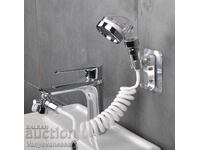 Sink shower with flexible hose with wall hanging and nozzle