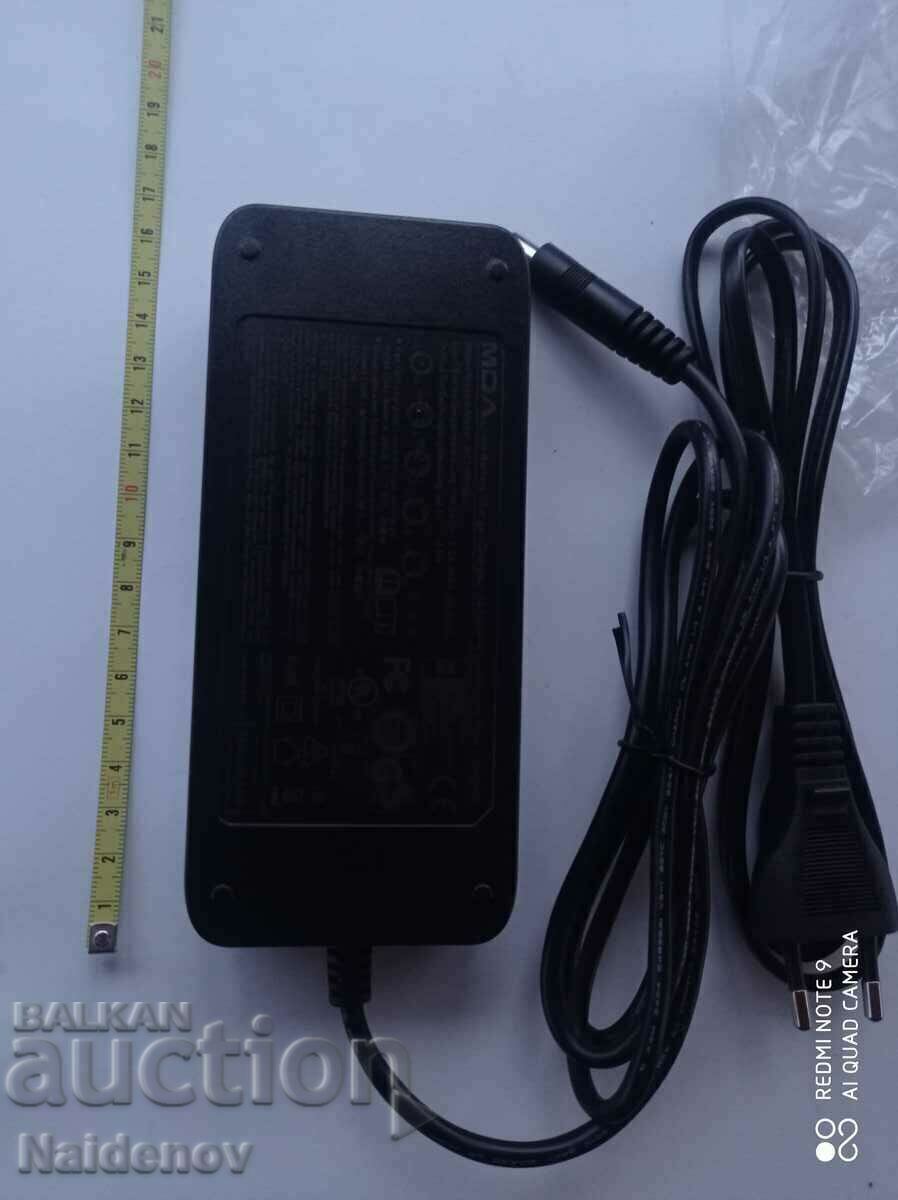 Incarcator scuter electric nou cu preț € 9.00 | 17.60 BGN Incarcator scuter electric nou cu preț € 9.00 | 17.60 BGN