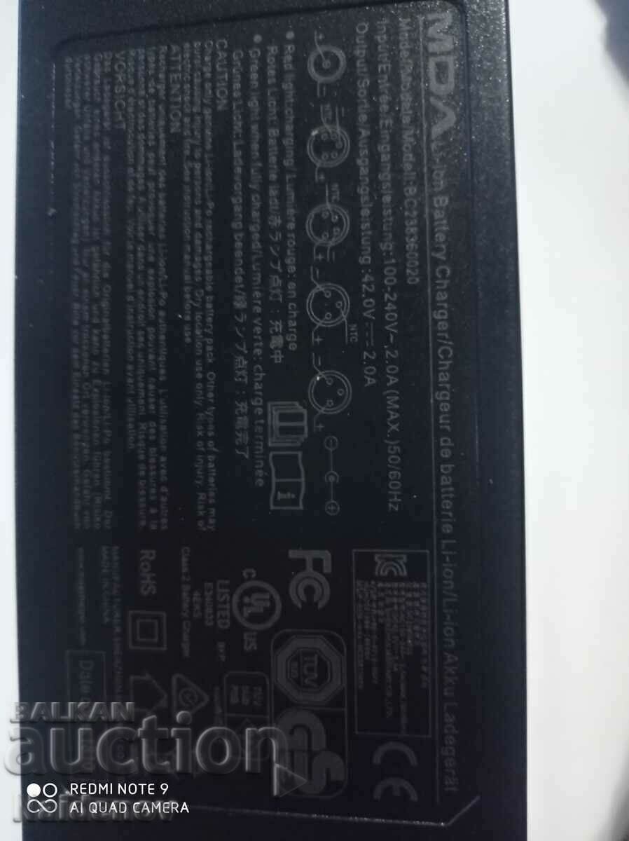 Livrarea Incarcator scuter electric nou Livrarea Incarcator scuter electric nou