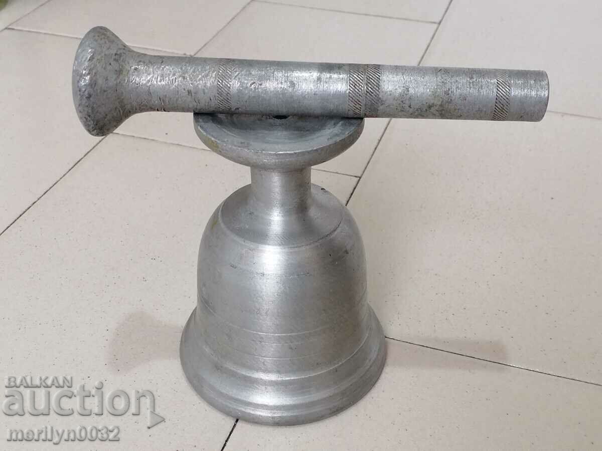 Delivery of Old white metal mortar, pestle, mortar Delivery of Old white metal mortar, pestle, mortar