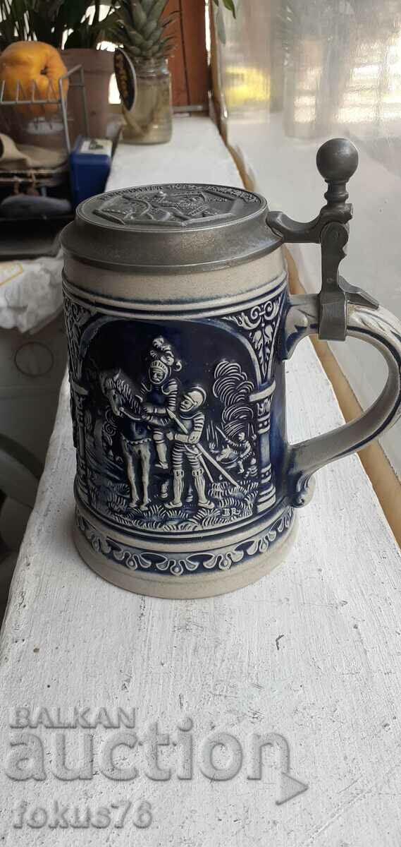 Collectible German beer mug with lid marking