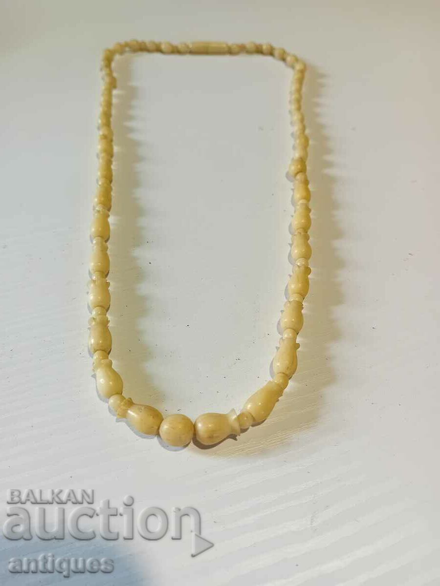 Auction  Antique bone necklace