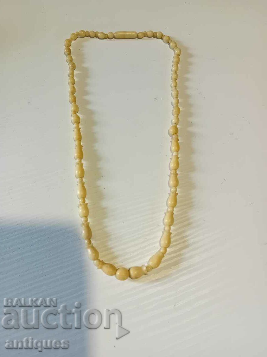 Delivery of Antique bone necklace