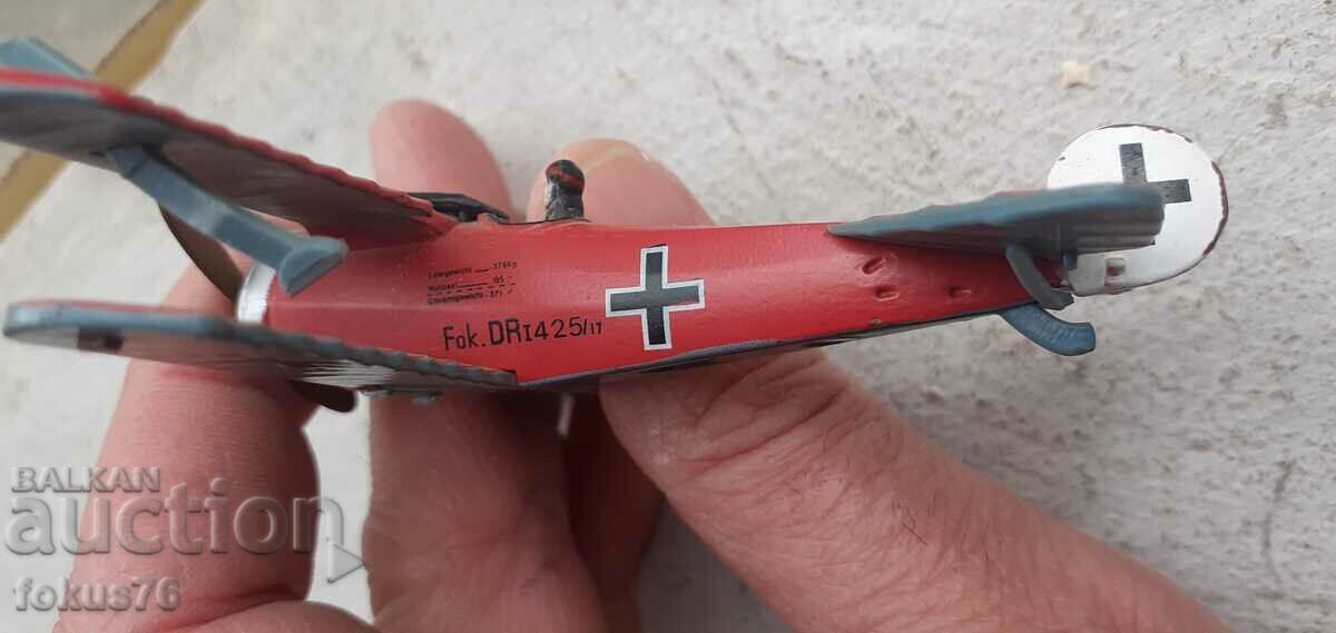 Auction  Small collectible metal toy airplane