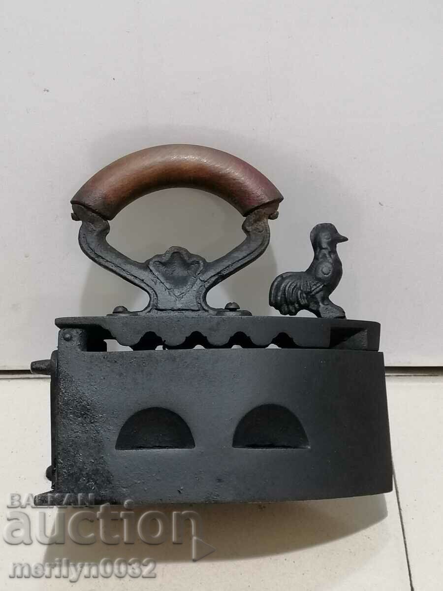 Auction  An old iron on fire