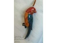 Figurină veche de jucărie cu papagal