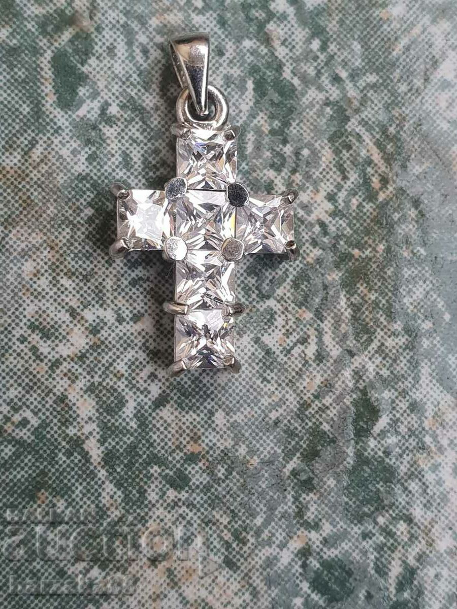 Silver cross with stones