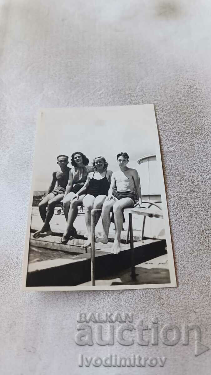 Photo Lying Young men and women on the beach 1943