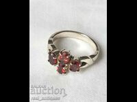 Silver ring with garnets