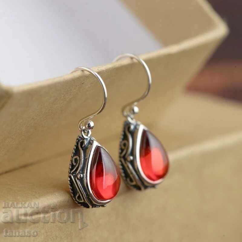 Earrings with red zircons with price 25.00 BGN | € 12.78 Earrings with red zircons with price 25.00 BGN | € 12.78