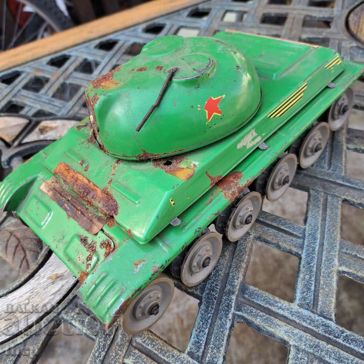 Old tin toy tank for parts