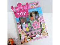 Set of children's make-up, shadows and nail polish with accessories