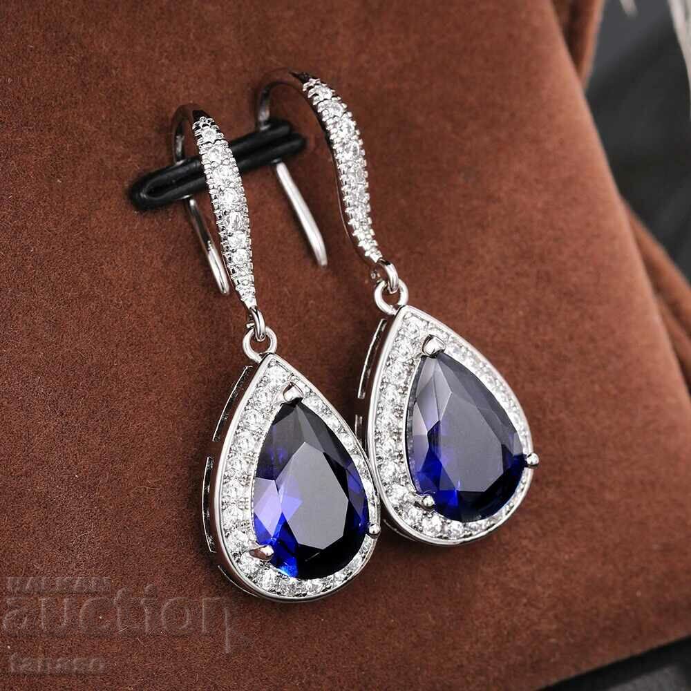 Delicate earrings with blue sapphires