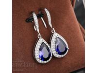 Delicate earrings with blue sapphires