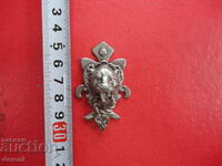 Antique small bronze lion knocker