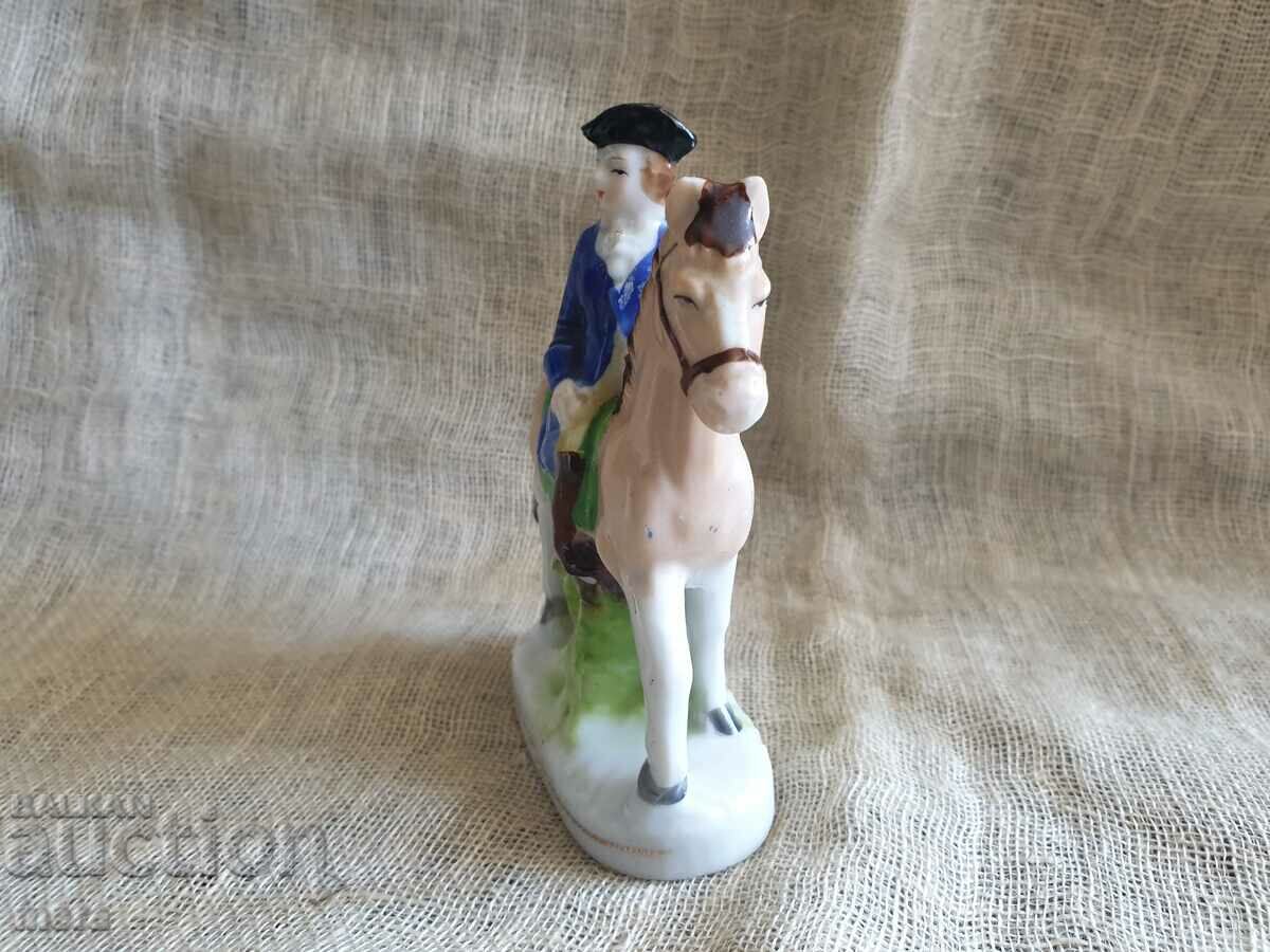 Auction  Porcelain figure of a nobleman on a horse