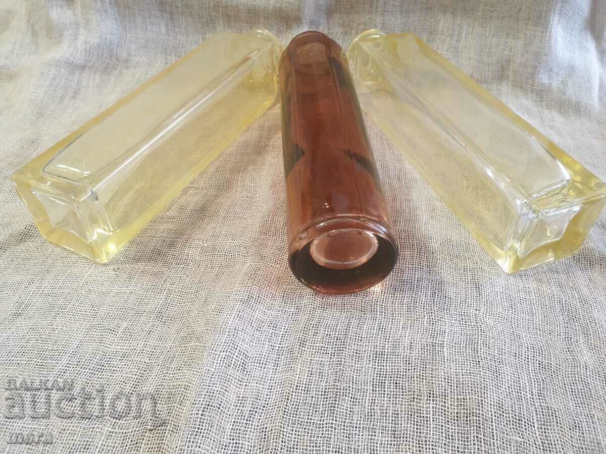 Πολλά τρία χρωματιστά γυάλινα μπουκάλια - 5