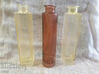 Lot of three colored glass bottles
