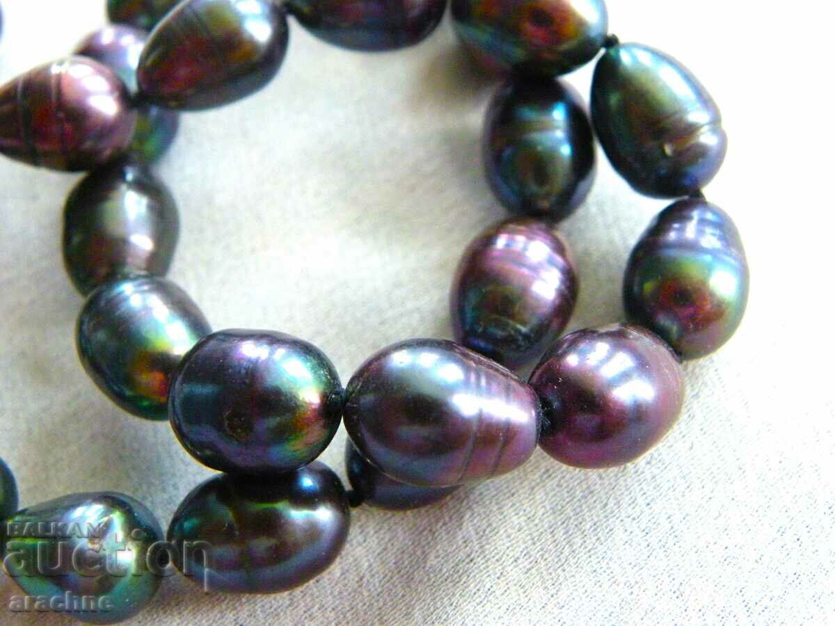 Korean necklace of large dark pearls with price 150.00 BGN | € 76.69 Korean necklace of large dark pearls with price 150.00 BGN | € 76.69