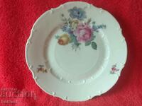 Old porcelain plate flowers embossed surface marked