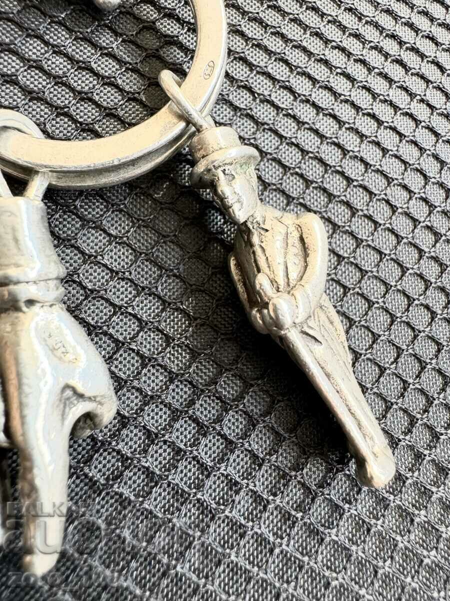 Δημοπρασία Ασημένιο μπρελόκ 50 γραμμαρίων Δημοπρασία Ασημένιο μπρελόκ 50 γραμμαρίων