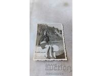 Photo Kostenets Young girl sitting on a large stone 1970