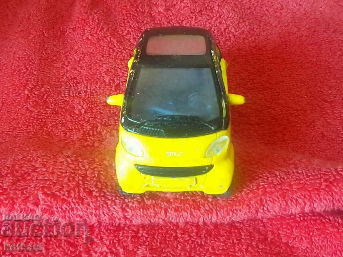 Auction Old small metal car Maisto 1/33 CHINA Citi-Coupe smart Auction Old small metal car Maisto 1/33 CHINA Citi-Coupe smart