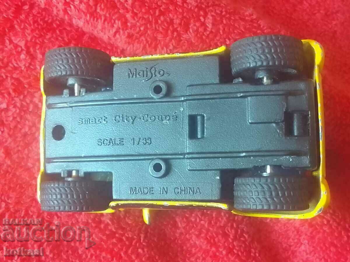 Old small metal car Maisto 1/33 CHINA Citi-Coupe smart - 6 Old small metal car Maisto 1/33 CHINA Citi-Coupe smart - 6