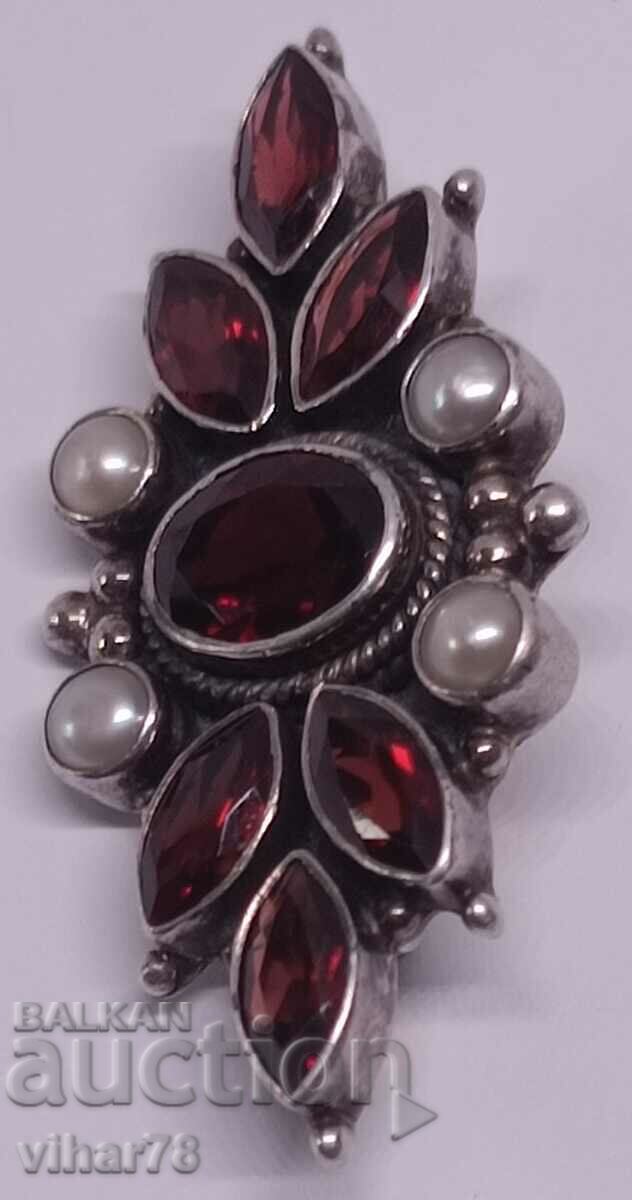 Auction Silver brooch with garnet and pearls Auction Silver brooch with garnet and pearls