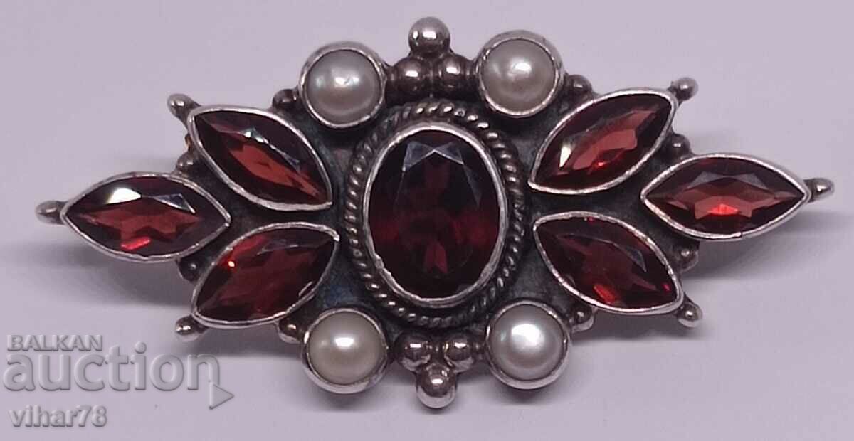 Silver brooch with garnet and pearls