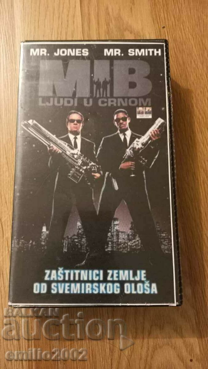 Casetă video Bărbați în negru Casetă video Bărbați în negru