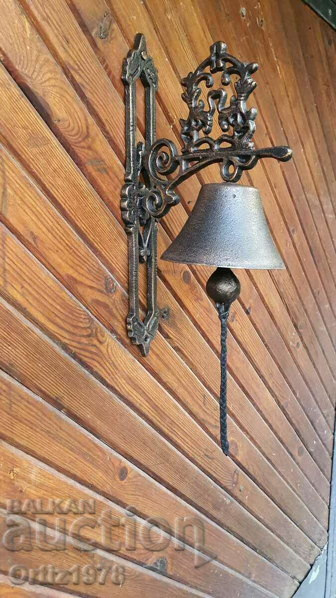 Auction  A large cast iron bell, with a loud, clear and resounding ring!