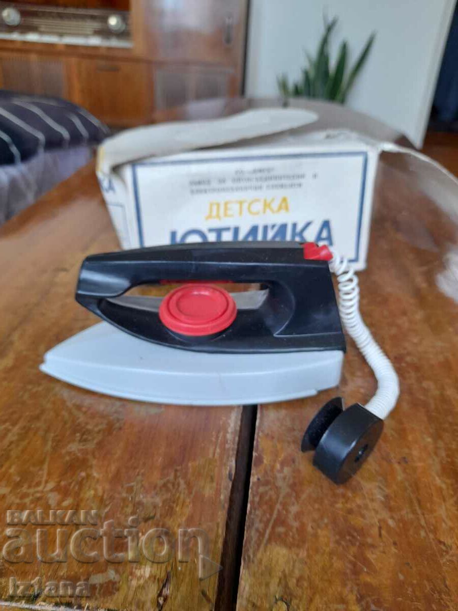 An old children's iron with price 37.00 BGN | € 18.92 An old children's iron with price 37.00 BGN | € 18.92