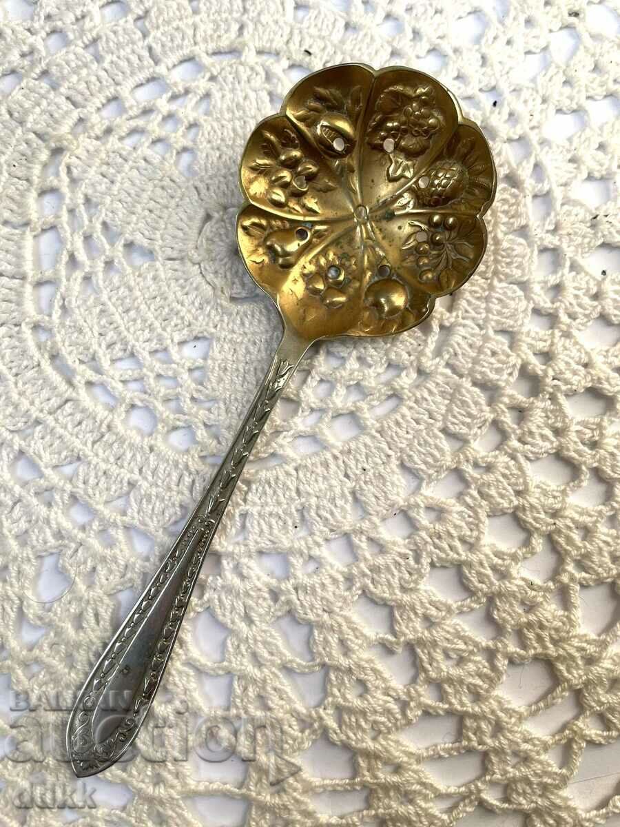 Beautiful spoon - strainer from England, with markings