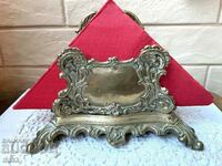 A beautiful large 2 piece brass napkin holder purchased from England