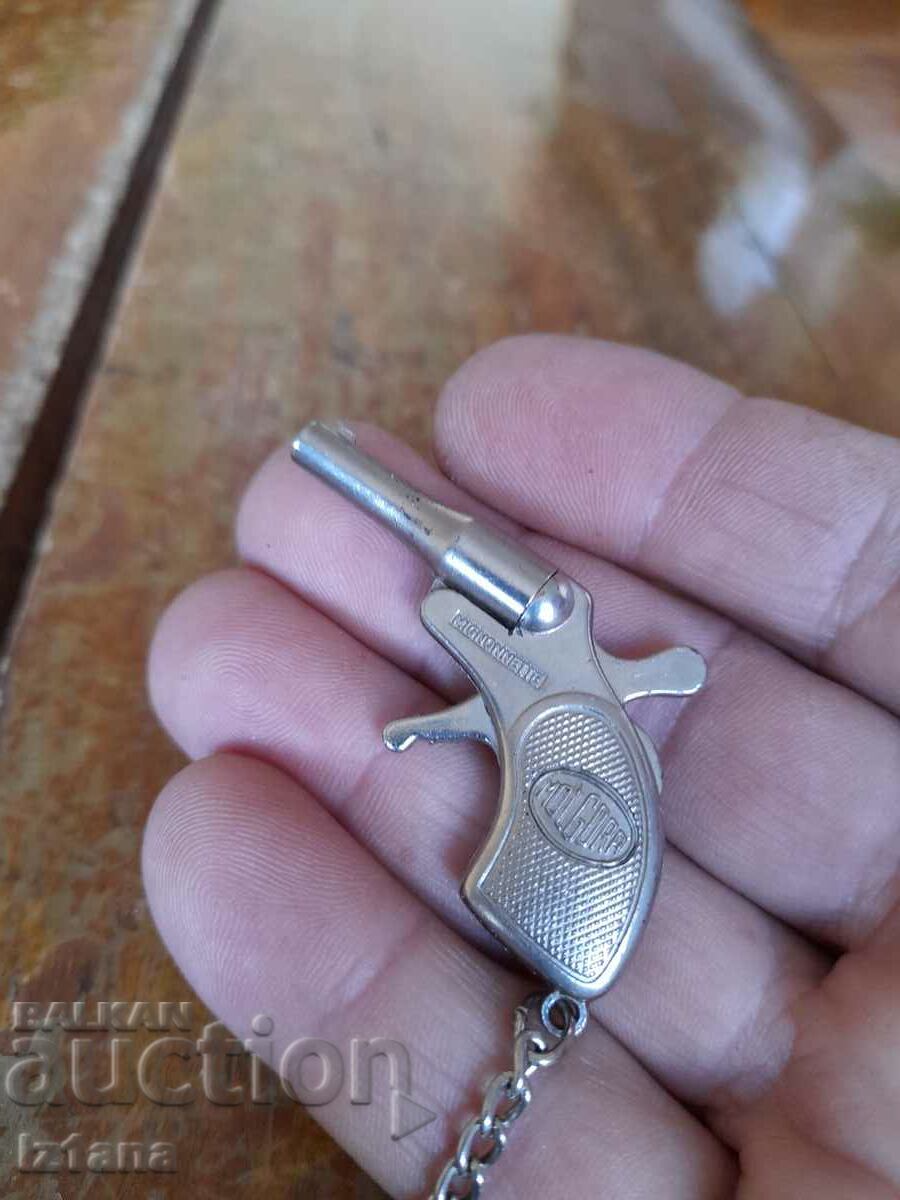 Auction Old key chain Pistol Auction Old key chain Pistol