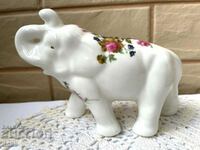 A beautiful bone china elephant purchased from England
