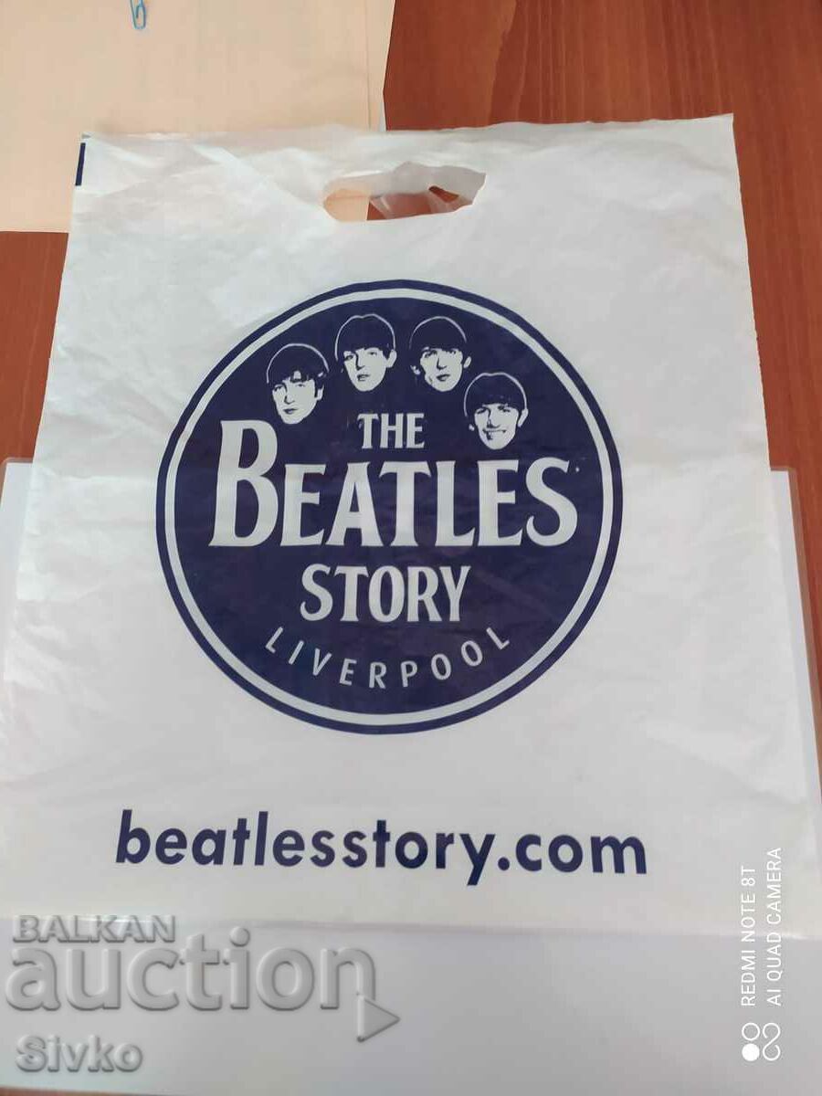 Delivery of A bag from a Beatles store in Liverpool Delivery of A bag from a Beatles store in Liverpool