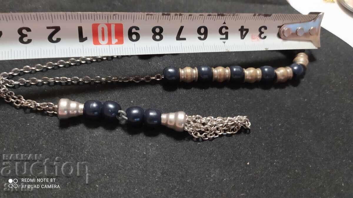 Delivery of Metal and wood rosary